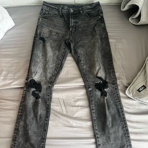 American Eagle black distressed ripped jeans